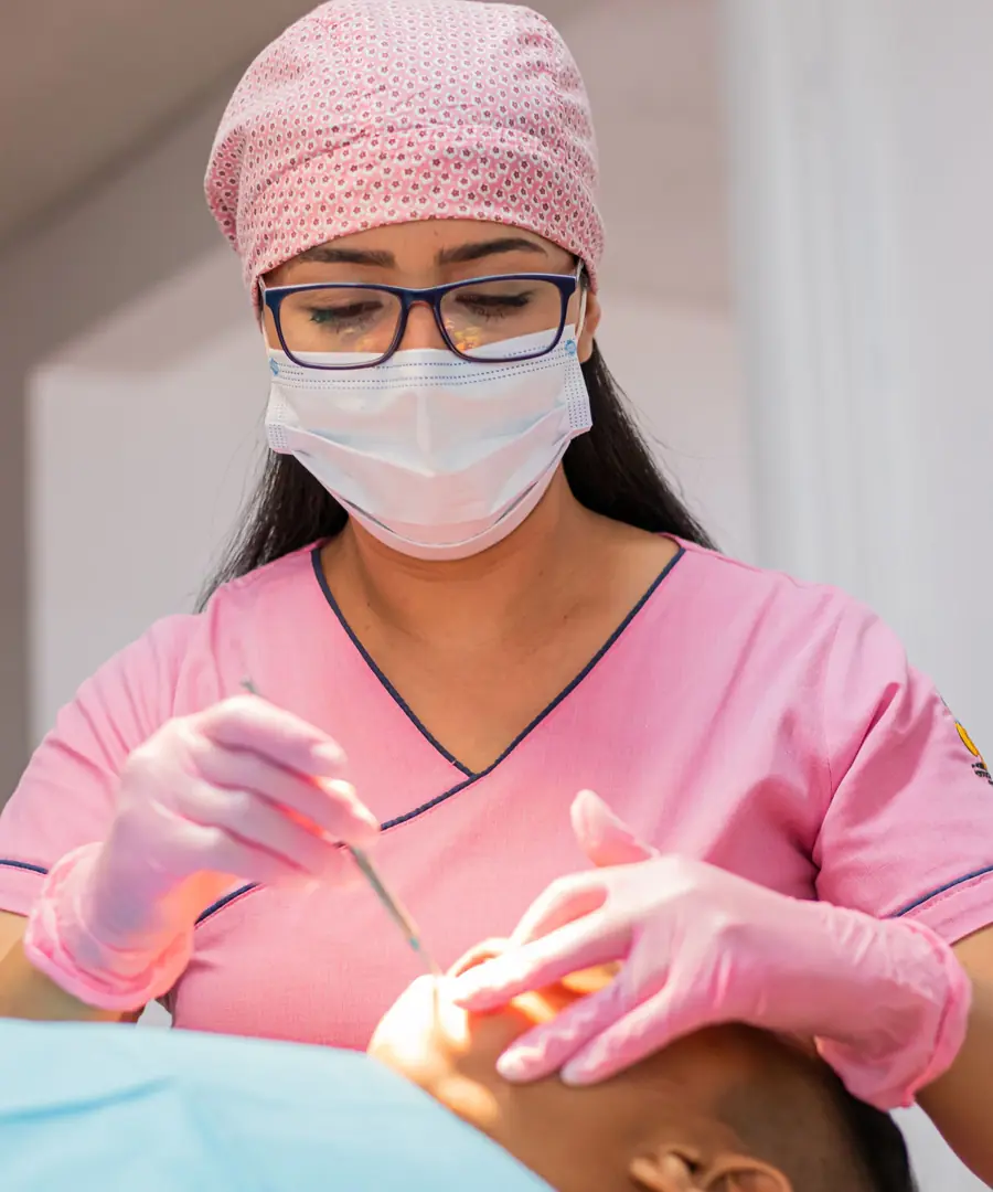 Illustrative photograph of a dentist treating a patient